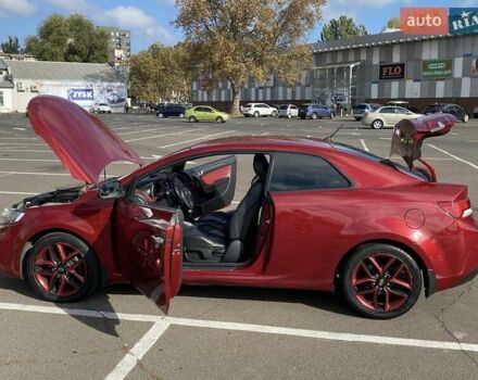 Красный Киа Cerato KOUP, объемом двигателя 2 л и пробегом 107 тыс. км за 10200 $, фото 11 на Automoto.ua