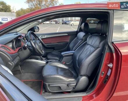 Красный Киа Cerato KOUP, объемом двигателя 2 л и пробегом 107 тыс. км за 10200 $, фото 16 на Automoto.ua