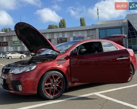 Красный Киа Cerato KOUP, объемом двигателя 2 л и пробегом 107 тыс. км за 10200 $, фото 12 на Automoto.ua