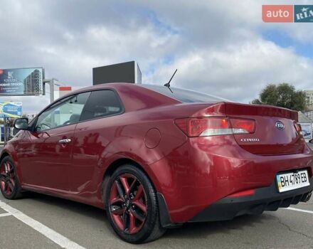 Красный Киа Cerato KOUP, объемом двигателя 2 л и пробегом 107 тыс. км за 10200 $, фото 9 на Automoto.ua