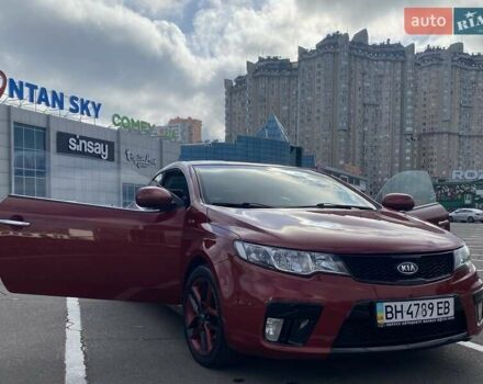 Красный Киа Cerato KOUP, объемом двигателя 2 л и пробегом 107 тыс. км за 10200 $, фото 5 на Automoto.ua