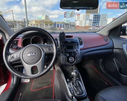 Красный Киа Cerato KOUP, объемом двигателя 2 л и пробегом 107 тыс. км за 10200 $, фото 18 на Automoto.ua