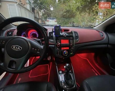 Красный Киа Cerato KOUP, объемом двигателя 2 л и пробегом 107 тыс. км за 10200 $, фото 39 на Automoto.ua