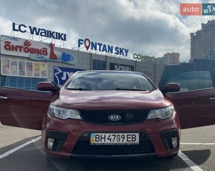 Красный Киа Cerato KOUP, объемом двигателя 2 л и пробегом 107 тыс. км за 10200 $, фото 3 на Automoto.ua