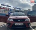 Красный Киа Cerato KOUP, объемом двигателя 2 л и пробегом 107 тыс. км за 10200 $, фото 3 на Automoto.ua