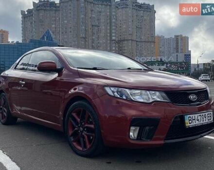 Красный Киа Cerato KOUP, объемом двигателя 2 л и пробегом 107 тыс. км за 10200 $, фото 4 на Automoto.ua