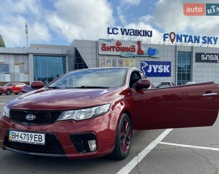Красный Киа Cerato KOUP, объемом двигателя 2 л и пробегом 107 тыс. км за 10200 $, фото 1 на Automoto.ua