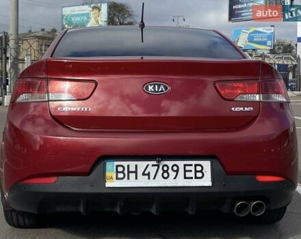 Красный Киа Cerato KOUP, объемом двигателя 2 л и пробегом 107 тыс. км за 10200 $, фото 6 на Automoto.ua