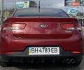 Красный Киа Cerato KOUP, объемом двигателя 2 л и пробегом 107 тыс. км за 10200 $, фото 6 на Automoto.ua