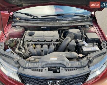 Красный Киа Cerato KOUP, объемом двигателя 2 л и пробегом 107 тыс. км за 10200 $, фото 13 на Automoto.ua