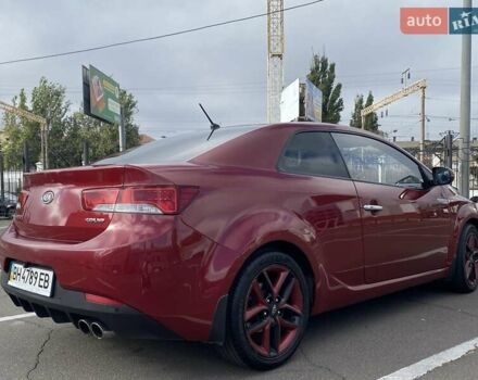 Красный Киа Cerato KOUP, объемом двигателя 2 л и пробегом 107 тыс. км за 10200 $, фото 7 на Automoto.ua