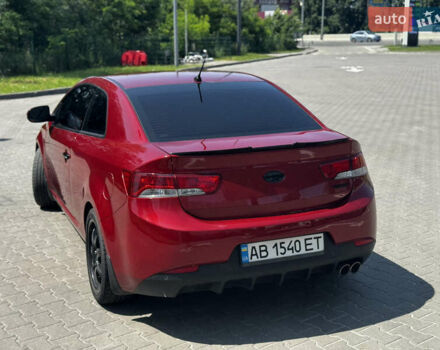 Красный Киа Cerato KOUP, объемом двигателя 2 л и пробегом 180 тыс. км за 7800 $, фото 5 на Automoto.ua
