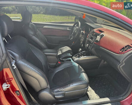 Красный Киа Cerato KOUP, объемом двигателя 2 л и пробегом 180 тыс. км за 7800 $, фото 17 на Automoto.ua
