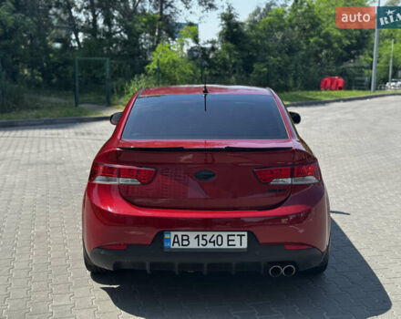 Красный Киа Cerato KOUP, объемом двигателя 2 л и пробегом 180 тыс. км за 7800 $, фото 6 на Automoto.ua