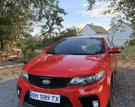 Красный Киа Cerato KOUP, объемом двигателя 1.6 л и пробегом 167 тыс. км за 7000 $, фото 1 на Automoto.ua