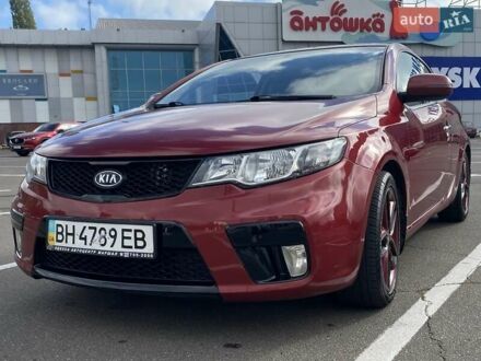 Красный Киа Cerato KOUP, объемом двигателя 2 л и пробегом 107 тыс. км за 10200 $, фото 1 на Automoto.ua
