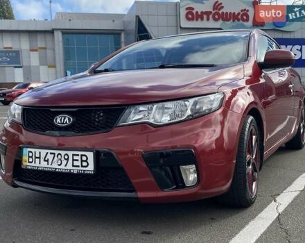 Червоний Кіа Cerato KOUP, об'ємом двигуна 2 л та пробігом 107 тис. км за 10200 $, фото 1 на Automoto.ua