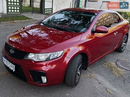 Червоний Кіа Cerato KOUP, об'ємом двигуна 2 л та пробігом 220 тис. км за 8800 $, фото 1 на Automoto.ua
