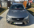 Серый Киа Cerato KOUP, объемом двигателя 2 л и пробегом 105 тыс. км за 8000 $, фото 1 на Automoto.ua