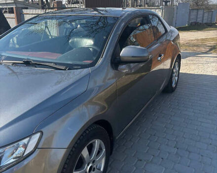 Серый Киа Cerato KOUP, объемом двигателя 2 л и пробегом 105 тыс. км за 8000 $, фото 2 на Automoto.ua