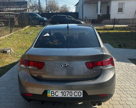 Серый Киа Cerato KOUP, объемом двигателя 2 л и пробегом 105 тыс. км за 8000 $, фото 9 на Automoto.ua