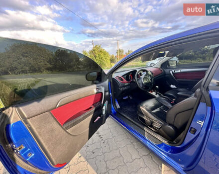 Синий Киа Cerato KOUP, объемом двигателя 2 л и пробегом 144 тыс. км за 8350 $, фото 24 на Automoto.ua