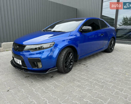 Синій Кіа Cerato KOUP, об'ємом двигуна 2 л та пробігом 236 тис. км за 9500 $, фото 4 на Automoto.ua