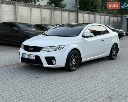 Білий Кіа Черато, об'ємом двигуна 2 л та пробігом 165 тис. км за 8300 $, фото 2 на Automoto.ua