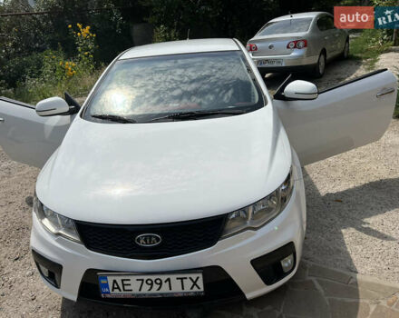 Білий Кіа Черато, об'ємом двигуна 2 л та пробігом 140 тис. км за 9200 $, фото 1 на Automoto.ua