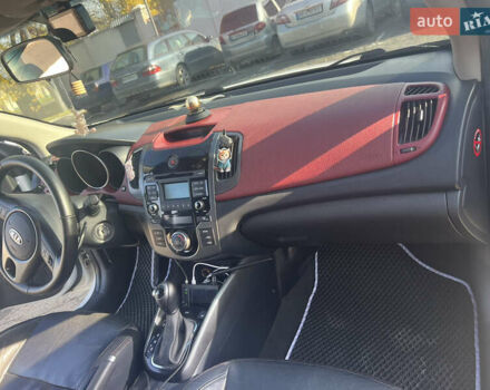 Белый Киа Черато, объемом двигателя 2 л и пробегом 213 тыс. км за 8600 $, фото 10 на Automoto.ua