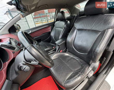 Белый Киа Черато, объемом двигателя 2 л и пробегом 155 тыс. км за 8490 $, фото 18 на Automoto.ua