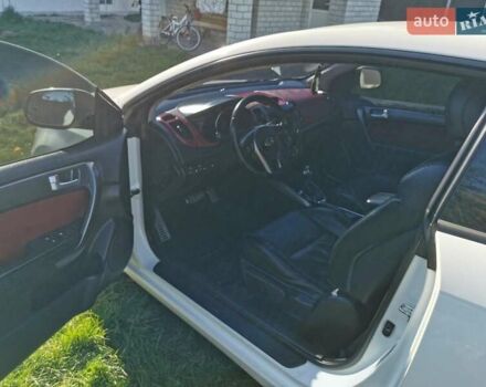 Білий Кіа Черато, об'ємом двигуна 2 л та пробігом 139 тис. км за 9800 $, фото 7 на Automoto.ua