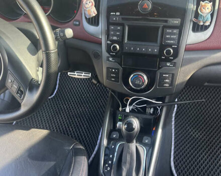 Белый Киа Черато, объемом двигателя 2 л и пробегом 213 тыс. км за 8600 $, фото 9 на Automoto.ua