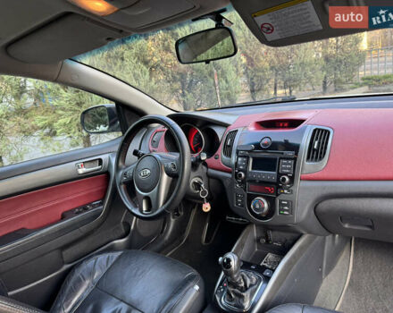 Белый Киа Черато, объемом двигателя 2 л и пробегом 195 тыс. км за 7800 $, фото 10 на Automoto.ua