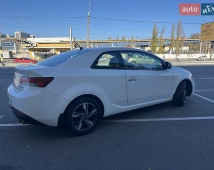 Білий Кіа Черато, об'ємом двигуна 2 л та пробігом 235 тис. км за 7700 $, фото 4 на Automoto.ua