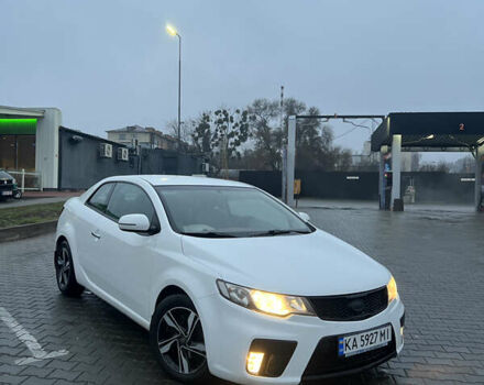 Белый Киа Черато, объемом двигателя 2 л и пробегом 236 тыс. км за 9000 $, фото 1 на Automoto.ua