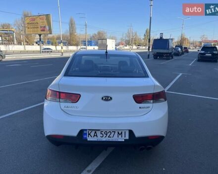 Білий Кіа Черато, об'ємом двигуна 2 л та пробігом 235 тис. км за 7700 $, фото 5 на Automoto.ua