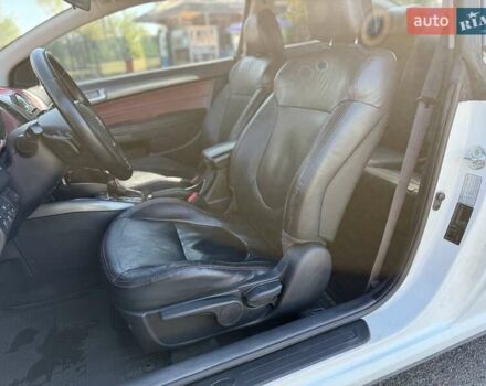 Білий Кіа Черато, об'ємом двигуна 2 л та пробігом 175 тис. км за 6800 $, фото 18 на Automoto.ua