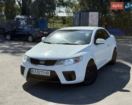 Білий Кіа Черато, об'ємом двигуна 2 л та пробігом 175 тис. км за 6800 $, фото 1 на Automoto.ua