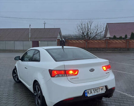 Белый Киа Черато, объемом двигателя 2 л и пробегом 236 тыс. км за 9000 $, фото 3 на Automoto.ua
