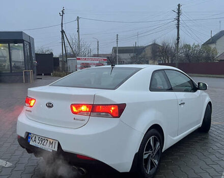 Белый Киа Черато, объемом двигателя 2 л и пробегом 236 тыс. км за 9000 $, фото 2 на Automoto.ua