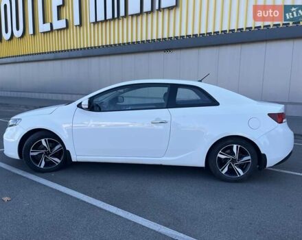 Білий Кіа Черато, об'ємом двигуна 2 л та пробігом 235 тис. км за 7700 $, фото 7 на Automoto.ua