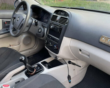 Белый Киа Черато, объемом двигателя 1.6 л и пробегом 174 тыс. км за 5500 $, фото 11 на Automoto.ua