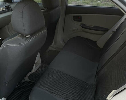 Белый Киа Черато, объемом двигателя 1.6 л и пробегом 174 тыс. км за 5500 $, фото 7 на Automoto.ua