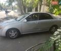 Белый Киа Черато, объемом двигателя 2 л и пробегом 260 тыс. км за 4000 $, фото 2 на Automoto.ua