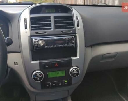 Белый Киа Черато, объемом двигателя 1.6 л и пробегом 144 тыс. км за 5000 $, фото 4 на Automoto.ua