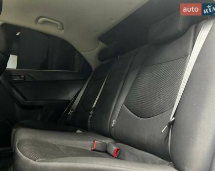 Білий Кіа Черато, об'ємом двигуна 1.59 л та пробігом 180 тис. км за 6300 $, фото 15 на Automoto.ua