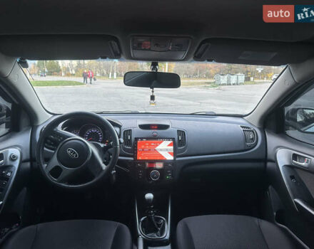 Білий Кіа Черато, об'ємом двигуна 1.59 л та пробігом 154 тис. км за 7500 $, фото 10 на Automoto.ua