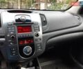 Білий Кіа Черато, об'ємом двигуна 1.59 л та пробігом 210 тис. км за 7300 $, фото 11 на Automoto.ua