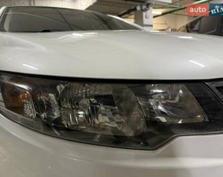 Білий Кіа Черато, об'ємом двигуна 2 л та пробігом 150 тис. км за 11400 $, фото 11 на Automoto.ua